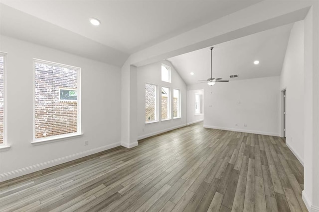 318 Boston, Princeton, TX 75407 - unfurnished living room featuring wood finished floors, vaulted ceiling, ceiling fan, and recessed lighting