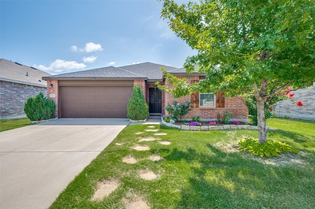 1221 Rivers Creek Ln, Little Elm, TX 75068 - ranch-style home featuring brick siding, an attached garage, concrete driveway, and a front yard