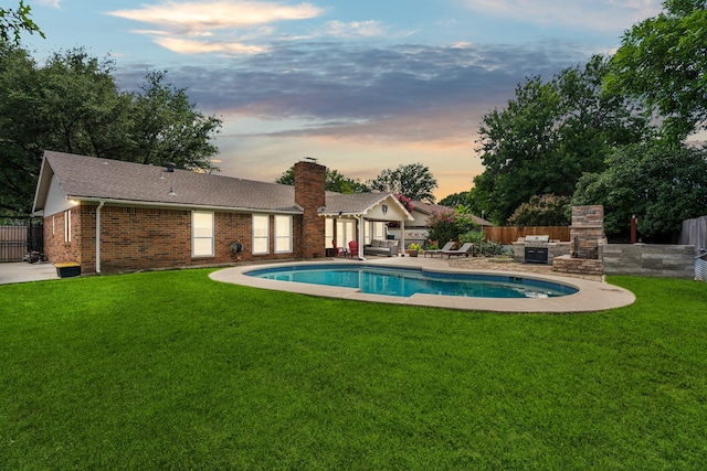 3905 Chestnut St, Fort Worth, TX 76137 - pool at dusk featuring a patio