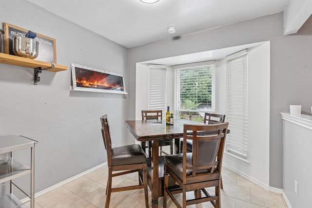 3905 Chestnut St, Fort Worth, TX 76137 - dining area featuring light tile patterned floors and baseboards