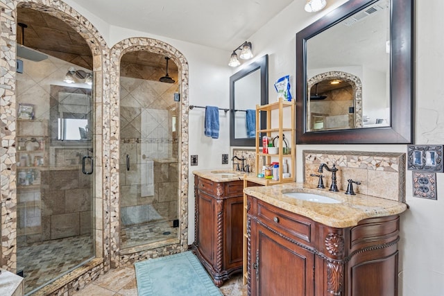 3905 Chestnut St, Fort Worth, TX 76137 - full bath with a shower stall, two vanities, and decorative backsplash