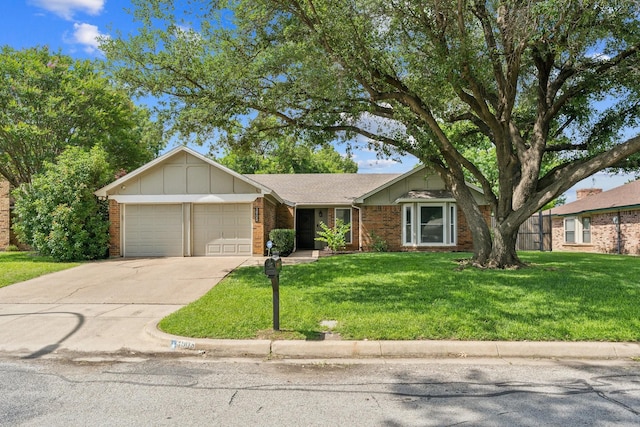 3905 Chestnut St, Fort Worth, TX 76137 - view of front of house featuring an attached garage, brick siding, driveway, and a front lawn