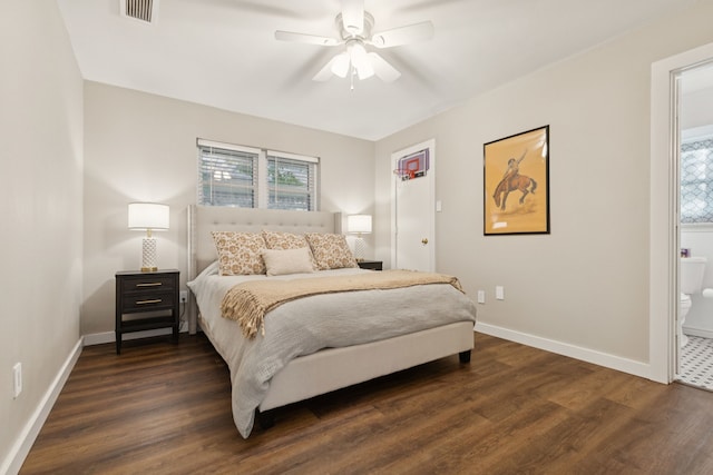 10306 Cimmaron Trl, Dallas, TX 75243 - bedroom with dark wood-style floors, connected bathroom, and ceiling fan