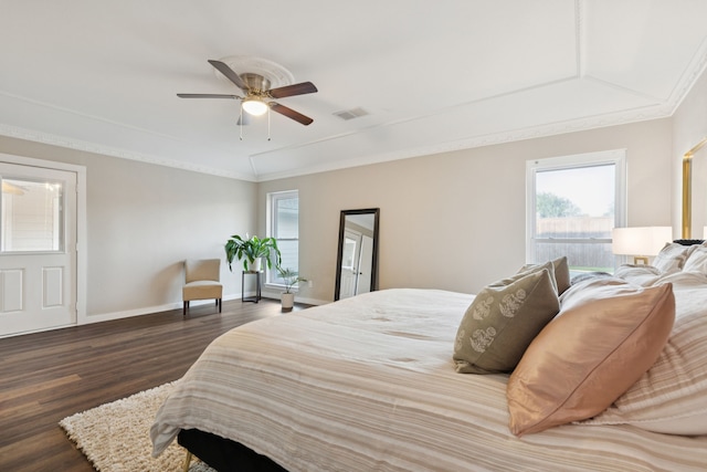 10306 Cimmaron Trl, Dallas, TX 75243 - bedroom with wood finished floors, multiple windows, ornamental molding, and ceiling fan