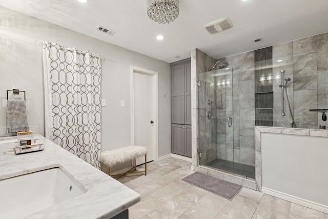 10306 Cimmaron Trl, Dallas, TX 75243 - bathroom with a stall shower, vanity, and recessed lighting