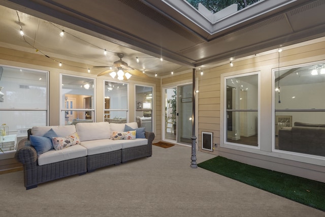 10306 Cimmaron Trl, Dallas, TX 75243 - sunroom with carpet floors, outdoor lounge area, and a ceiling fan