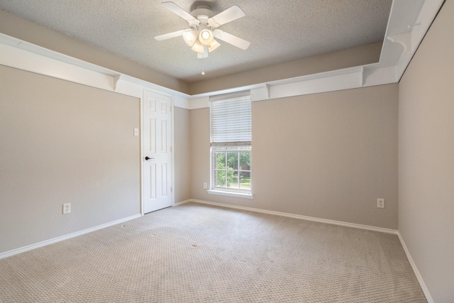 9129 Apollo Ct, Frisco, TX 75033 - spare room featuring carpet floors, a textured ceiling, and a ceiling fan