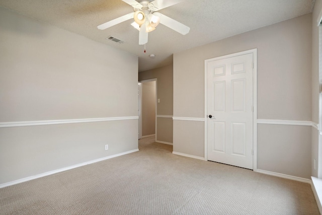 9129 Apollo Ct, Frisco, TX 75033 - unfurnished bedroom featuring light colored carpet and a ceiling fan