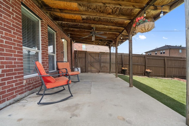 9129 Apollo Ct, Frisco, TX 75033 - fenced backyard with a patio and ceiling fan