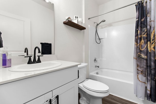 418 Madison Way, Princeton, TX 75407 - bathroom with vanity, shower / bath combo with shower curtain, and wood finished floors