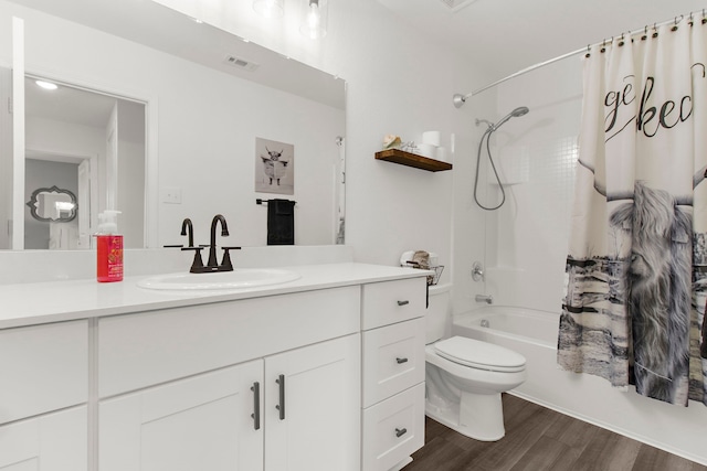 418 Madison Way, Princeton, TX 75407 - full bathroom with vanity, shower / bathtub combination with curtain, and wood finished floors