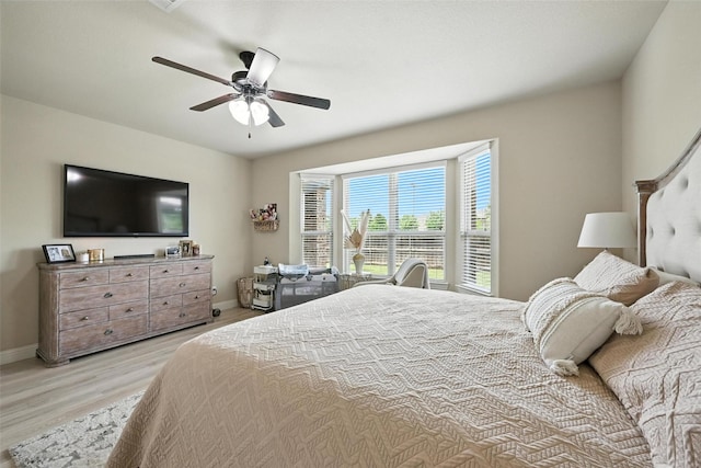 10704 Parnell Dr, Mckinney, TX 75072 - bedroom with wood finished floors and a ceiling fan