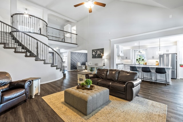 180 Highbridge Ln, Prosper, TX 75078 - living room with high vaulted ceiling, stairway, ceiling fan, and dark wood-type flooring