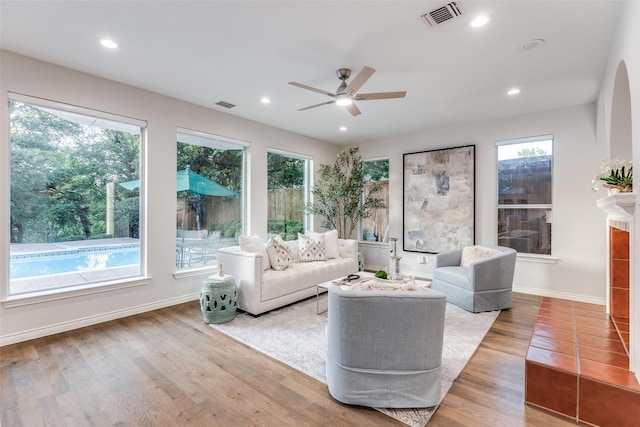 8931 Club Creek Cir, Dallas, TX 75238 - living room with a ceiling fan, wood finished floors, and recessed lighting