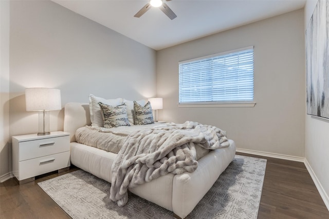 8931 Club Creek Cir, Dallas, TX 75238 - bedroom featuring dark wood finished floors and ceiling fan