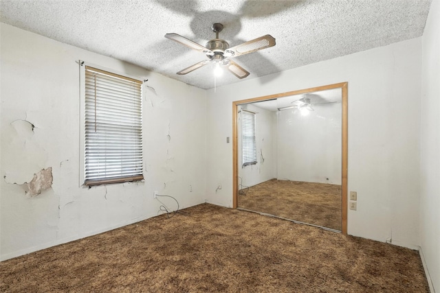 221 E 7th St, Weatherford, TX 76086 - unfurnished bedroom with carpet, a closet, a textured ceiling, and a ceiling fan