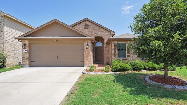 6348 Porthole Ln, Fort Worth, TX 76179 - view of front of property with a garage, brick siding, driveway, and a front yard