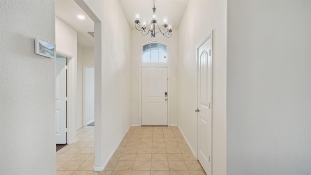 6348 Porthole Ln, Fort Worth, TX 76179 - foyer with a chandelier and light tile patterned floors