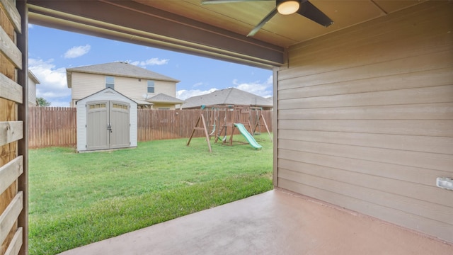 6348 Porthole Ln, Fort Worth, TX 76179 - fenced backyard featuring a patio, a storage unit, ceiling fan, and a playground