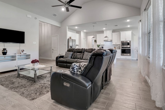 237 Gardenia Dr, Azle, TX 76020 - living area featuring light wood-style floors, ceiling fan, high vaulted ceiling, and recessed lighting