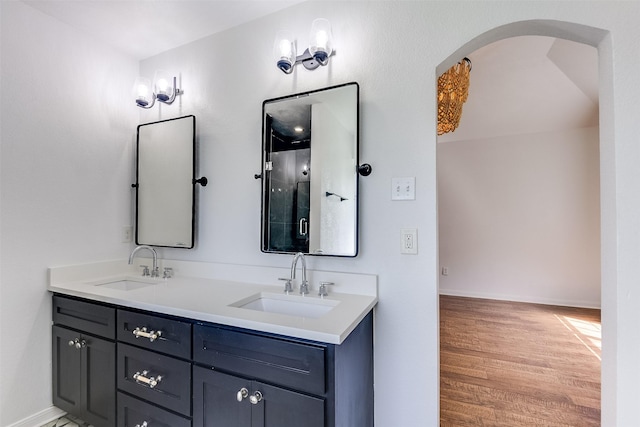 700 Stanford Dr, Waxahachie, TX 75165 - full bathroom featuring double vanity, wood finished floors, and a shower