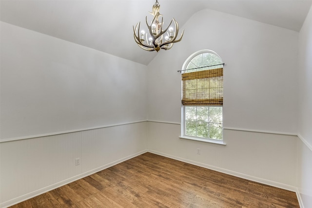 700 Stanford Dr, Waxahachie, TX 75165 - unfurnished room featuring a chandelier, lofted ceiling, and wood finished floors