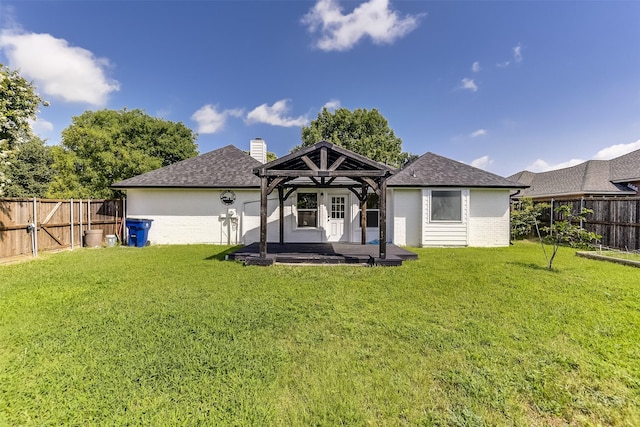 700 Stanford Dr, Waxahachie, TX 75165 - rear view of property featuring a gazebo, brick siding, roof with shingles, and a fenced backyard