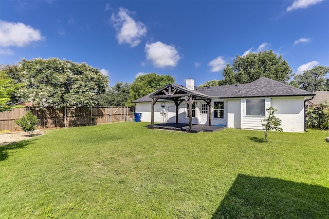 700 Stanford Dr, Waxahachie, TX 75165 - rear view of house with a gazebo, brick siding, a fenced backyard, a patio, and a shingled roof