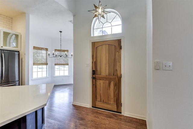 700 Stanford Dr, Waxahachie, TX 75165 - entrance foyer featuring a chandelier and dark wood finished floors