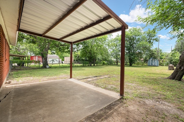721 SW Hillside Dr, Burleson, TX 76028 - fenced backyard with a storage shed and a patio