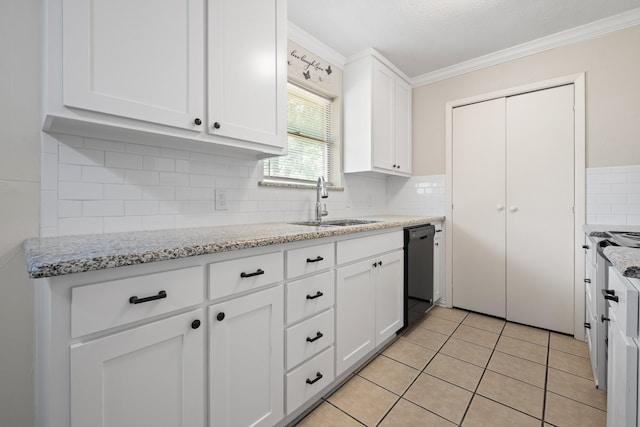 721 SW Hillside Dr, Burleson, TX 76028 - kitchen featuring dishwasher, crown molding, white cabinets, backsplash, and light stone counters