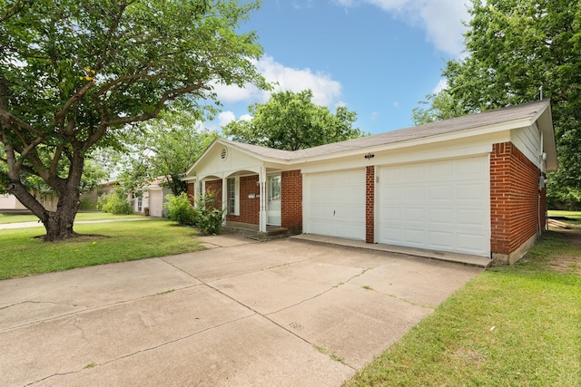 721 SW Hillside Dr, Burleson, TX 76028 - ranch-style home featuring brick siding, a front yard, concrete driveway, and a garage