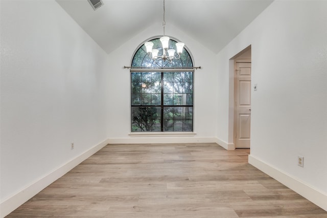 4030 Walnut Ln, Midlothian, TX 76065 - unfurnished dining area with a chandelier, vaulted ceiling, and light wood-style flooring