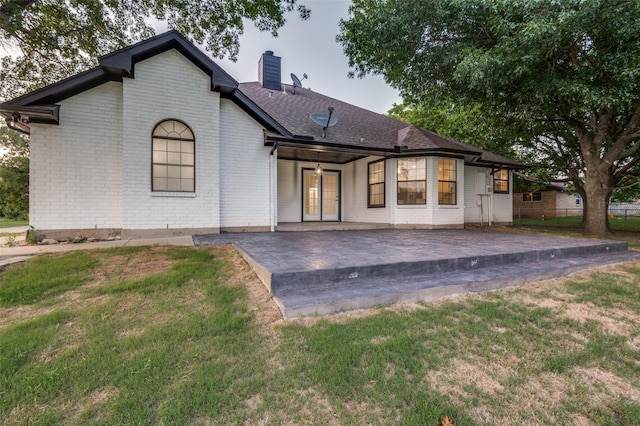 4030 Walnut Ln, Midlothian, TX 76065 - rear view of house featuring a lawn, a patio area, a chimney, brick siding, and french doors