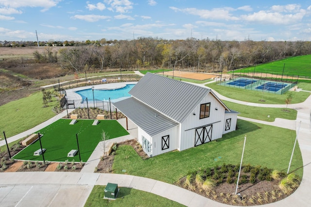 1327 Burgess St, Royse City, TX 75189 - drone / aerial view of a pool area