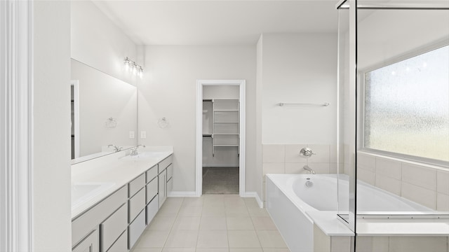 1327 Burgess St, Royse City, TX 75189 - full bath featuring double vanity, a garden tub, tile patterned floors, and a spacious closet
