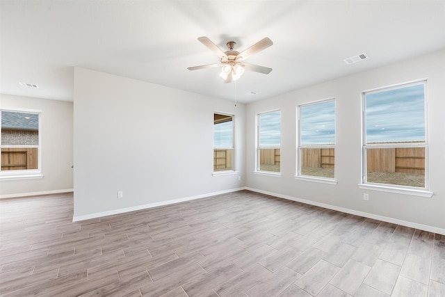 1327 Burgess St, Royse City, TX 75189 - empty room featuring light wood finished floors and ceiling fan