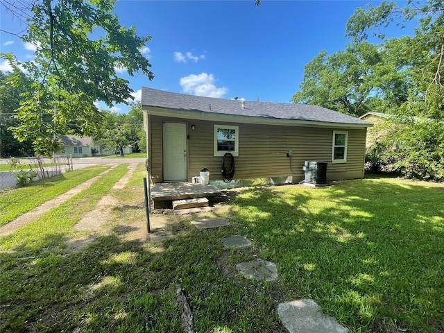 207 Whitworth St, Sulphur Springs, TX 75482 - back of house featuring a yard