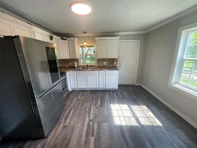 207 Whitworth St, Sulphur Springs, TX 75482 - kitchen with smart refrigerator, a textured ceiling, dark wood finished floors, white cabinets, and decorative backsplash