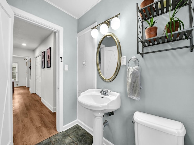 3921 Bryce Ave, Fort Worth, TX 76107 - half bath featuring toilet and ornamental molding