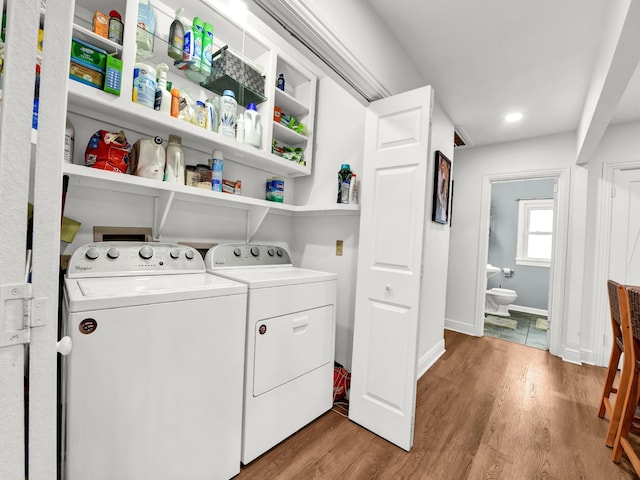 3921 Bryce Ave, Fort Worth, TX 76107 - laundry area featuring separate washer and dryer and light wood finished floors