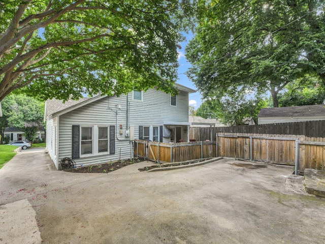3921 Bryce Ave, Fort Worth, TX 76107 - rear view of property featuring a patio