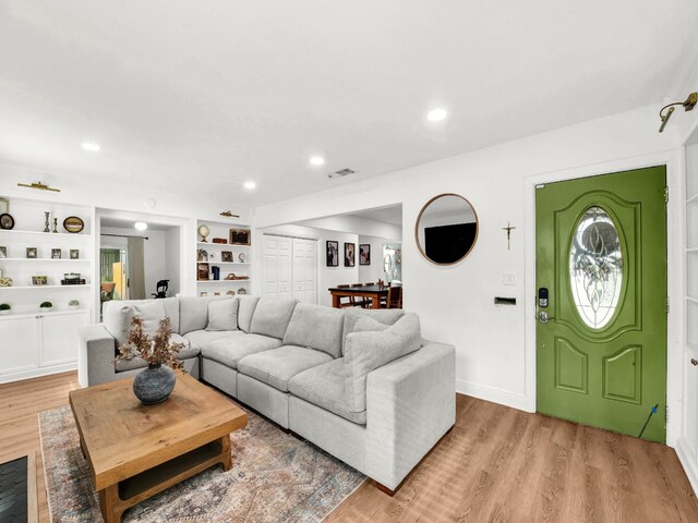 3921 Bryce Ave, Fort Worth, TX 76107 - living room with light wood finished floors and recessed lighting