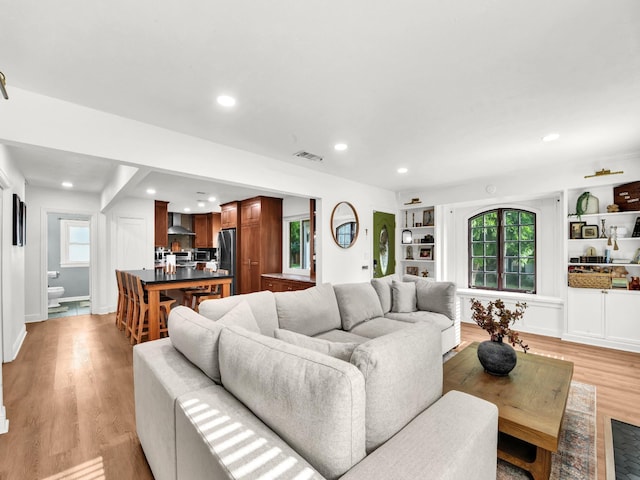 3921 Bryce Ave, Fort Worth, TX 76107 - living room with recessed lighting and light wood-style floors