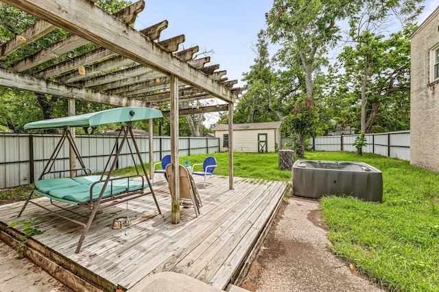 814 N Ollie St, Stephenville, TX 76401 - wooden terrace with a fenced backyard and a shed