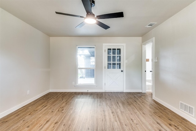 707 Lake Meadows Dr, Rockwall, TX 75087 - unfurnished room with wood finished floors and a ceiling fan