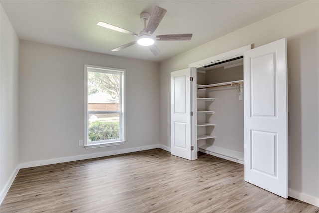 707 Lake Meadows Dr, Rockwall, TX 75087 - unfurnished bedroom featuring light wood-type flooring, a closet, and ceiling fan