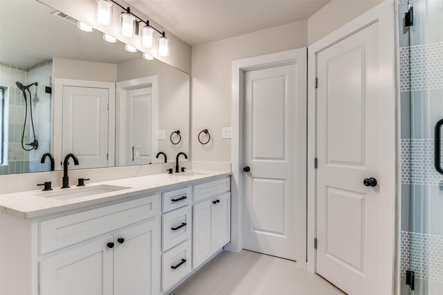 707 Lake Meadows Dr, Rockwall, TX 75087 - full bathroom with double vanity, tile patterned flooring, and a shower with curtain