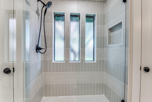 707 Lake Meadows Dr, Rockwall, TX 75087 - bathroom featuring tiled shower