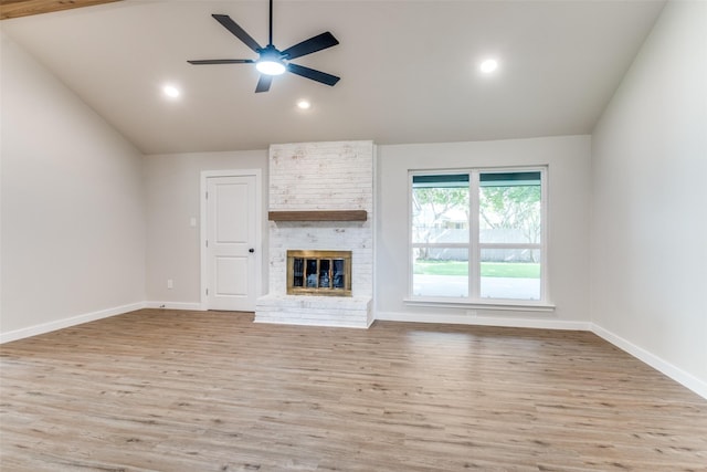 707 Lake Meadows Dr, Rockwall, TX 75087 - unfurnished living room with vaulted ceiling, ceiling fan, light wood-style flooring, recessed lighting, and a brick fireplace